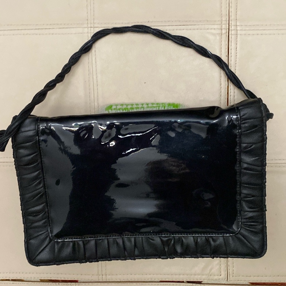 Vintage black patent leather evening bag.